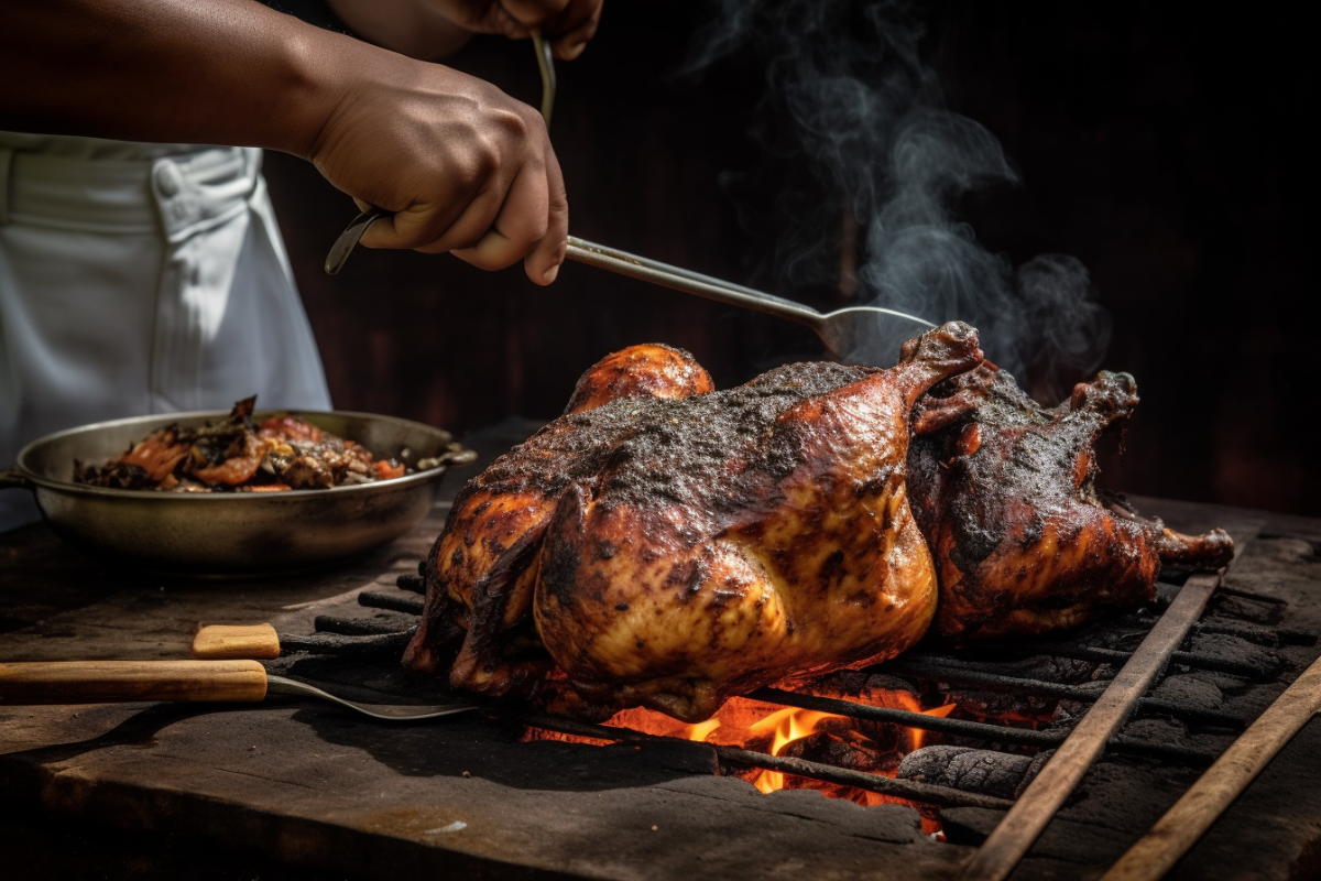 Close-up of Pollo Asado being grilled on charcoal with smoky marinades and grilling tools in a rustic setting.